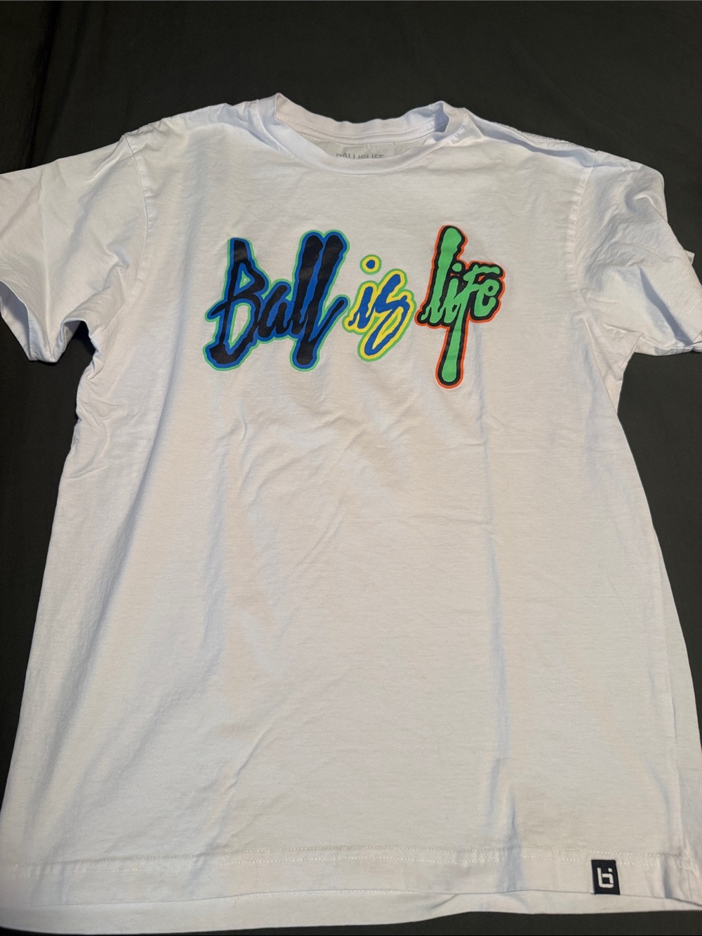 White 'Ball is Life' Graphic Tee with Multicolor Script
